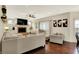 Bright living room with comfortable seating, fireplace, and stylish decor at 10715 Hamilton Pass, Fishers, IN 46037