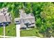 Aerial view of a luxury home showing the property's layout, landscaping, and neighborhood at 10725 Holliday Farms Blvd, Zionsville, IN 46077