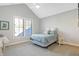 Cozy bedroom with vaulted ceiling, large window, and charming decor at 10725 Holliday Farms Blvd, Zionsville, IN 46077
