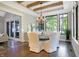 Bright dining room featuring a wood table, white chairs, and natural light at 10725 Holliday Farms Blvd, Zionsville, IN 46077