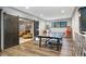 Game room featuring a ping pong table, pinball machine, and adjacent seating area at 10725 Holliday Farms Blvd, Zionsville, IN 46077