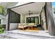 Cozy porch with comfortable seating and stylish decor, ideal for relaxation and enjoying the outdoors at 10725 Holliday Farms Blvd, Zionsville, IN 46077