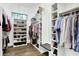 Spacious walk-in closet with custom shelving, ample storage, and natural light at 10725 Holliday Farms Blvd, Zionsville, IN 46077