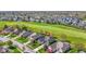 Beautiful aerial view of home and golf course with mature trees in desirable neighborhood at 10911 Innisbrooke Ln, Fishers, IN 46037