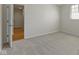 Bedroom with open door and view to a window at 10911 Innisbrooke Ln, Fishers, IN 46037