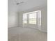 Bright bedroom featuring a bay window, neutral walls and carpet, and ceiling fan at 10911 Innisbrooke Ln, Fishers, IN 46037