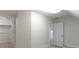 Hallway with walk-in closet at 10911 Innisbrooke Ln, Fishers, IN 46037