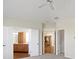 Hallway with multiple entryways leading to kitchen and additional spaces at 10911 Innisbrooke Ln, Fishers, IN 46037