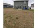 Large backyard with potential for landscaping and outdoor activities at 10931 N Longbranch St, Monrovia, IN 46157