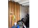 Garage space with exposed framing, containing an engine and car parts at 10931 N Longbranch St, Monrovia, IN 46157