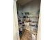 Walk-in pantry featuring abundant shelving with an array of storage items at 10931 N Longbranch St, Monrovia, IN 46157