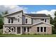 Charming two-story home featuring a modern design, brick accents, and well-manicured lawn at 1094 Christopher Ct, Greenwood, IN 46143