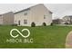 Spacious backyard with ample green space at 11555 Ross Common Dr, Indianapolis, IN 46229