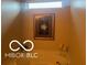 This bathroom features a bathtub and a framed painting at 11555 Ross Common Dr, Indianapolis, IN 46229
