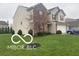 Well-maintained two-story home with beautiful landscaping at 11555 Ross Common Dr, Indianapolis, IN 46229
