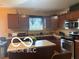 Spacious kitchen with stainless steel appliances and plenty of counter space at 11555 Ross Common Dr, Indianapolis, IN 46229