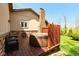 Back deck with a covered hot tub perfect for relaxation and entertaining guests outdoors at 1186 Castle Dr, Franklin, IN 46131