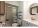Well-lit bathroom featuring a glass shower and a modern sink with a neutral color scheme at 1186 Castle Dr, Franklin, IN 46131