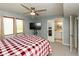 Spacious bedroom with an ensuite bathroom and a ceiling fan, offering comfort and convenience at 1186 Castle Dr, Franklin, IN 46131
