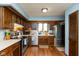 Well-lit kitchen with stainless steel appliances and ample cabinet space at 1186 Castle Dr, Franklin, IN 46131