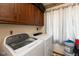 Convenient laundry room area complete with appliances and ample storage for efficient household tasks at 1186 Castle Dr, Franklin, IN 46131