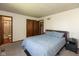 Comfortable bedroom features neutral walls, plush carpet, and an ensuite bathroom for added convenience at 1186 Castle Dr, Franklin, IN 46131