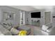 Bright living room with grey walls, wood flooring, a large mirror, sectional sofa and a large window at 12005 Hardwick Dr, Fishers, IN 46038