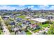 A captivating aerial view showcasing a charming neighborhood with the city skyline in the distance at 1317 Spann Ave, Indianapolis, IN 46203