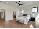 Bright main bedroom with hardwood floors, a walk-in closet and an ensuite bathroom at 1317 Spann Ave, Indianapolis, IN 46203