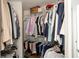 Organized walk-in closet with shelving and hanging storage at 13331 Grouse Point Trl, Carmel, IN 46033