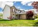 Attractive brick and vinyl two-story home featuring a well-kept lawn and beautiful landscaping for enhanced curb appeal at 13331 Grouse Point Trl, Carmel, IN 46033