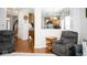 Bright living room provides comfortable seating with a view into the kitchen at 13331 Grouse Point Trl, Carmel, IN 46033