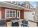 Enjoy this quaint backyard patio with seating for two and privacy fence at 1352 Middlebury Dr, Westfield, IN 46074