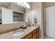 The bathroom features double sinks, granite countertops and a laundry area at 1352 Middlebury Dr, Westfield, IN 46074
