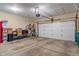 Spacious garage with concrete floor and automatic door opener; store your vehicles and toys at 1352 Middlebury Dr, Westfield, IN 46074