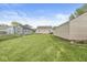 A well-maintained backyard with a grassy lawn at 1412 Wallace Ave, Indianapolis, IN 46201