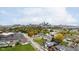 Panoramic aerial view of the city skyline surrounded by lush greenery and colorful autumn trees at 1453 English Ave, Indianapolis, IN 46201