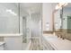 Bathroom featuring a glass-enclosed walk-in shower and vanity with a white countertop at 1453 English Ave, Indianapolis, IN 46201