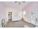 Bright Bedroom with pink walls, dresser, and access to bathroom and deck at 1453 English Ave, Indianapolis, IN 46201