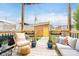 Cozy outdoor deck space with seating, plants, and an outdoor bar at 1453 English Ave, Indianapolis, IN 46201