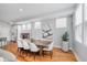 Bright dining room with modern decor, hardwood floors, and a stylish dining table at 1453 English Ave, Indianapolis, IN 46201