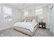 Inviting bedroom with neutral colors, carpet, and large windows at 1453 English Ave, Indianapolis, IN 46201