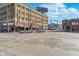 Street view showcasing a landmark building with shops, restaurants, and a decorative fountain at 1453 English Ave, Indianapolis, IN 46201