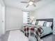 Cozy bedroom featuring a ceiling fan, neutral walls, and a comfortable bed with soft linens at 15986 Bugle Ridge Dr, Noblesville, IN 46060