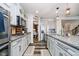 Elegant kitchen featuring stainless steel appliances, granite countertops, and ample cabinet space at 15986 Bugle Ridge Dr, Noblesville, IN 46060