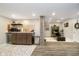 Finished basement kitchenette, ideal for entertaining with bar seating and modern finishes at 15986 Bugle Ridge Dr, Noblesville, IN 46060