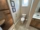 Bathroom with a walk-in shower, toilet, and vanity at 160 Bay Ridge Dr, Pendleton, IN 46064