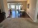Dining area with hardwood floors and view of living room and back patio doors at 160 Bay Ridge Dr, Pendleton, IN 46064