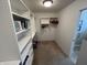 White walk-in closet with shelving and ample storage space at 160 Bay Ridge Dr, Pendleton, IN 46064
