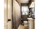 Stylish bathroom featuring gray walls, a tiled floor, and a sink with storage at 1733 N Spencer Ave, Indianapolis, IN 46218